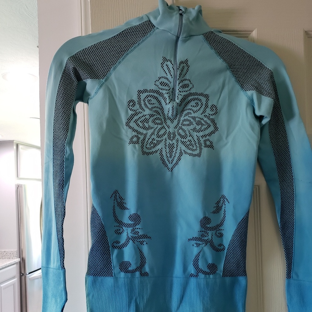 Athleta turquoise quarter Zip compression top.